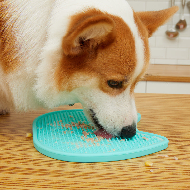 Tongue licking cats slow food bowl