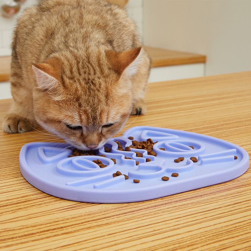 Tongue licking cats slow food bowl
